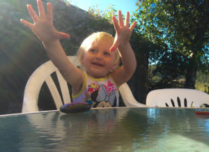 Sweet little Sydney showing off her Island Rock and ice cream hands.